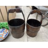 A PAIR OF VINTAGE WOODEN PAIL BUCKETS WITH METAL BANDING