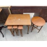 A RETRO TEAK NEST OF FIVE TABLES, FOUR BEING DROP LEASF, 15" DIA