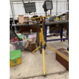 A 110V WORK LIGHT WITH TRIPOD STAND