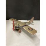 A VINTAGE TINPLATE CLOCKWORK ENGLISH MADE AEROPLANE MODEL