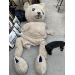 A LARGE TEDDY BEAR MASCOT OUTFIT