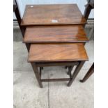 A MAHOGANY NEST OF THREE TABLES