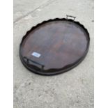 A VINTAGE WOODEN OVAL TRAY WITH GALLERY SIDES