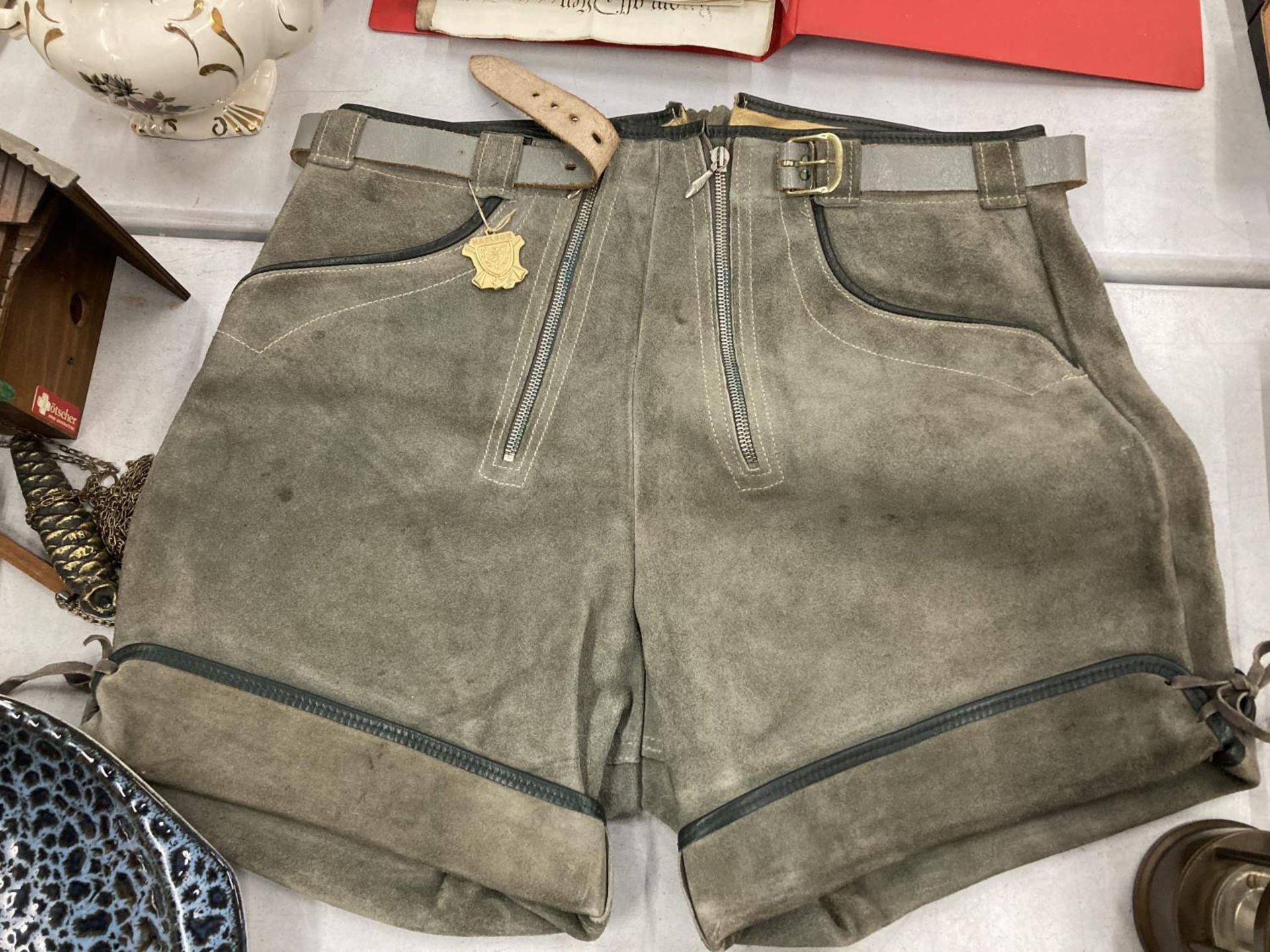 A PAIR OF SWISS/GERMAN SUEDE SHORTS - AS NEW