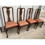 A SET OF FOUR QUEEN-ANNE STYLE DINING CHAIRS