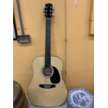 A 'SQUIER FENDER' ACOUSTIC GUITAR