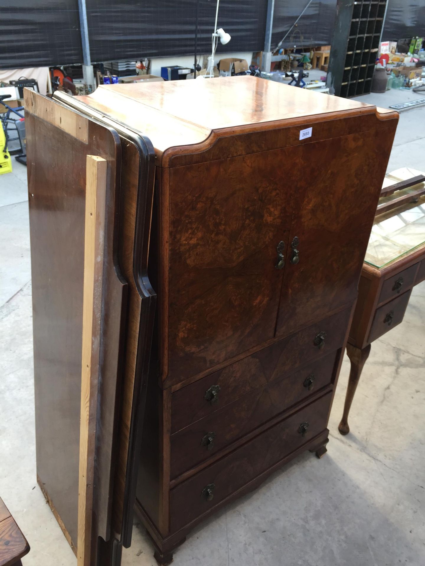 A MID 20TH CENTURY WALNUT TALLBOY AND BEDHEAD