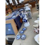 AN ASSORTMENT OF ORIENTAL STYLE CERAMIC ITEMS TO INCLUDE VASES AND A MALE FIGURE ETC