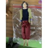 A HARRY STYLES TOY DOLL FIGURE