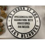 A CAST 'PEAKY BLINDERS' SIGN DIAMETER 24CM