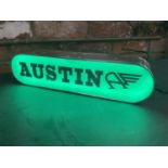 A AUSTIN ILLUMINATED LIGHT BOX SIGN - WORKING ORDER AT TIME OF CATALOGUING. WIDTH 44CM, HEIGHT 10.