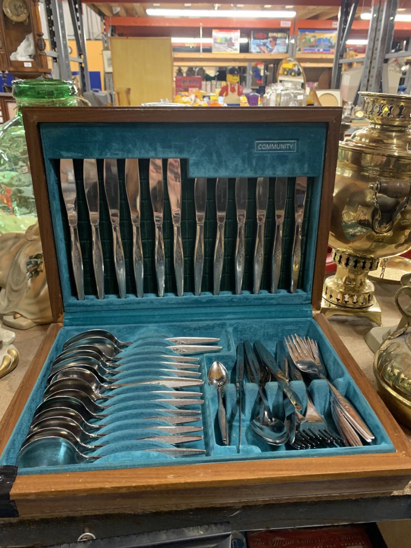 A VINTAGE CANTEEN OF CUTLERY IN A TEAK BOX