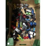 A BOX OF PLASTIC AND DIECAST CARS