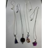 FOUR SILVER NECKLACES WITH PENDANTS