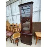 A STAG MINSTREL GLAZED CORNER CUPBOARD WITH CUPBOARD TO THE BASE