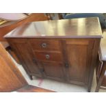 AN EDWARDIAN SIDE CABINET ENCLOSING THREE CUPBOARDS AND TWO DRAWERS, 42" WIDE