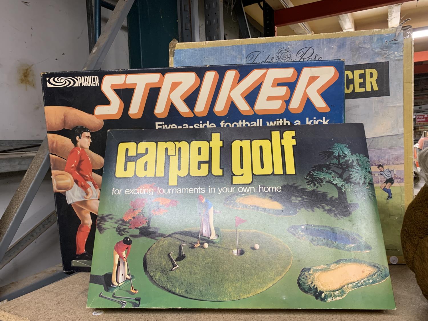 THREE VINTAGE GAMES TO INCLUDE CARPET GOLF, STRIKER AND TABLE TOP SOCCER