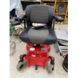 A PRIDE MOBILITY PRODUCTS ELECTRIC WHEELCHAIR WITH CHARGER