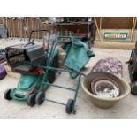 AN ASSORTMENT OF GARDEN ITEMS TO INCLUDE PLANTERS, A BARROW AND A QUALCAST ELECTRIC LAWN MOWER ETC