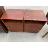 A PAIR OF MEREDREW RETRO TEAK BEDSIDE LOCKERS