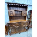 AN EARLY 20TH CENTURY OAK JACOBEAN STYLE DRESSER ON BARLEYTWIST LEGS, 54" WIDE