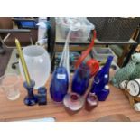 AN ASSORTMENT OF GLASS WARE TOI INCLUDE BLUE VASES, CANDLESTICK AND BOTTLES ETC