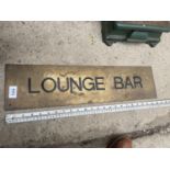 A BRASS 'LOUNGE BAR' SIGN (60CM)