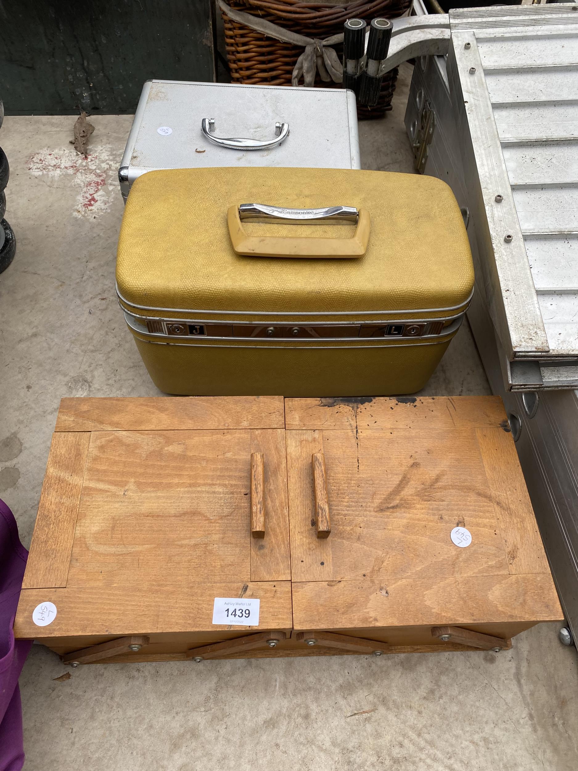 A VINTAGE WOODEN SEWING BOX, A RETRO VANITY CASE AND A FURTHER VANITY CASE