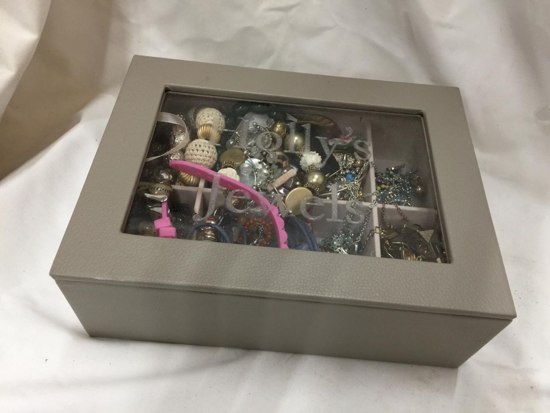 A BOX CONTAINING A QUANTITY OF COSTUME JEWELLERY TO INCLUDE BEADS, NECKLACES, BRACELETS, RINGS,