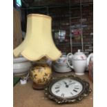 AN ORIENTAL STYLE YELLOW TABLE LAMP PLUS A VINTAGE STYLE WALL CLOCK
