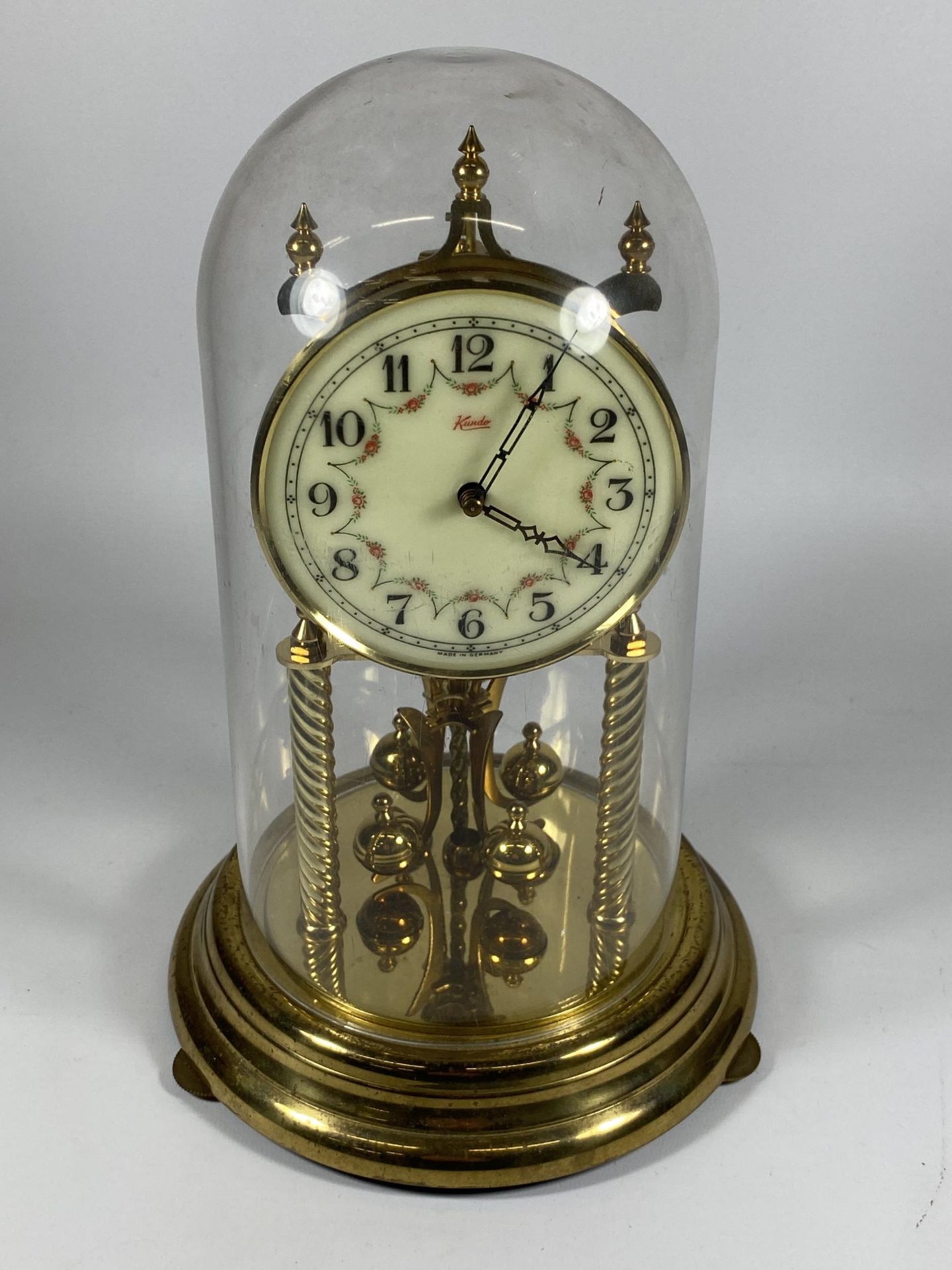 A VINTAGE KUNDO ANNIVERSARY DOMED CLOCK