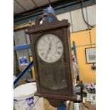 A MAHOGANY CASED WALL CLOCK AND MANTLE CLOCK BOTH IN NEED OF RESTORATION
