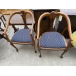 A PAIR OF LATE VICTORIAN ELBOW CHAIRS WITH PIERCED SPLAT BACKS, ON FRONT CABRIOLE LEGS, WITH BALL