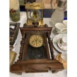 A MAHOGANY CASED VINTAGE WALL CLOCK PLUS A LARGE BRASS KUNDO ELECTRONIC CLOCK IN GLASS CASE