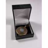 A BOXED 9CT YELLOW GOLD CASED MEMORIAL BROOCH