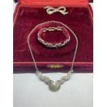 A SILVER NECKLACE, BROOCH AND BRACELETIN A PRESENTATION BOX