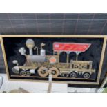 A GILT FRAMED SCRATCH BUILT IMAGE OF A TRAIN USING VARIOUS VINTAGE ITEMS