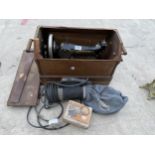 A VINTAGE SINGER SEWING MACHINE WITH WOODEN CARRY CASE AND A HOOVER HAND VACUUM