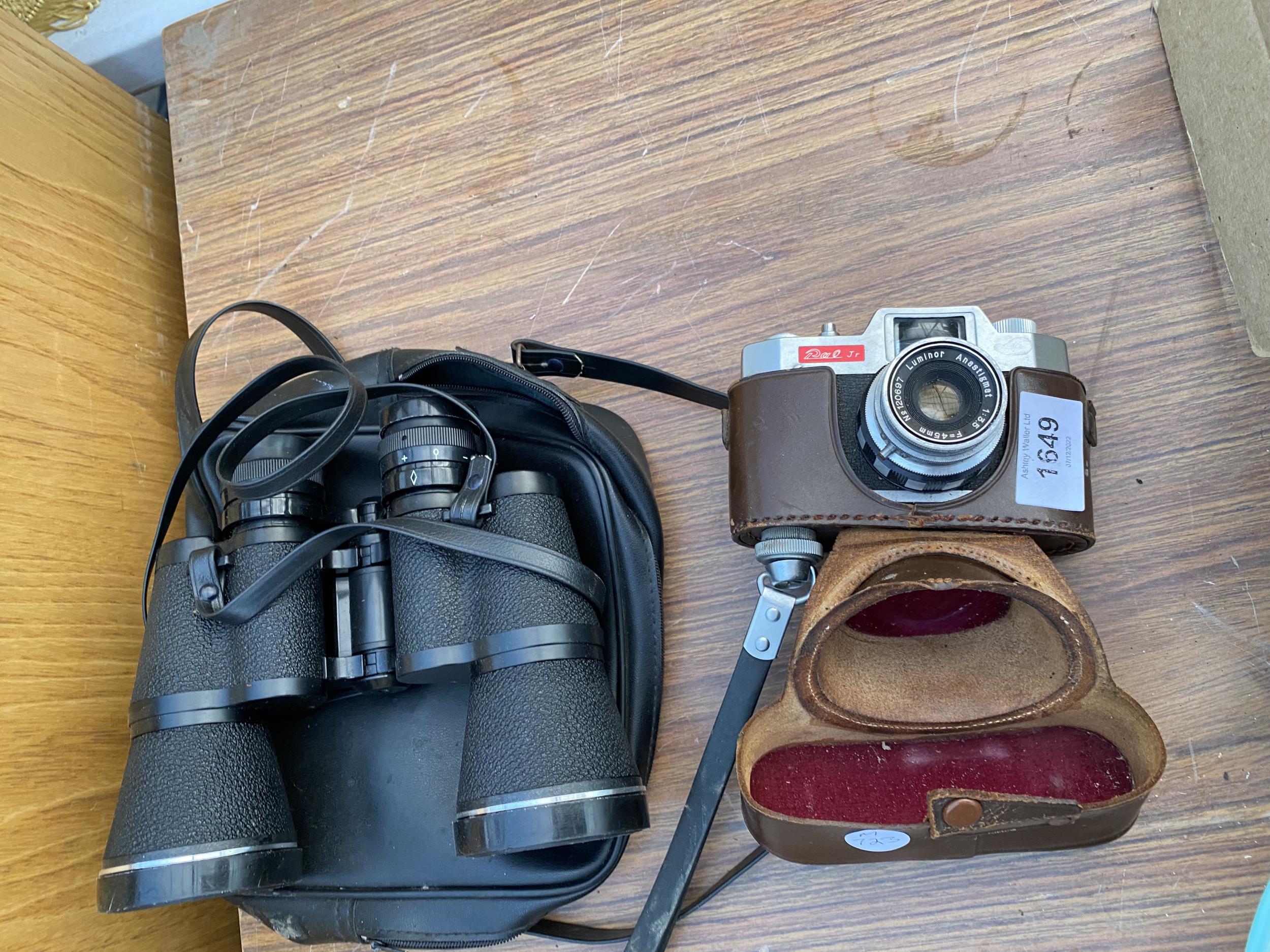 A VINTAGE PAL JR CAMERA AND A PAIR OF TASCO ZIP BINOCULARS