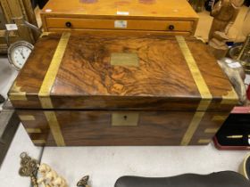 A MAHOGANY AND BRASS CAMPAIGN WRITING SLOPE WITH SECRET SIDE DRAWER, 25 X 25 X 51CM