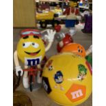 A COLLECTION OF M & M FIGURES AND FOOTBALL