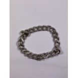 A SILVER CURB BRACELET