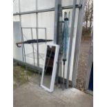 A WHITE MIRROR DOORED CABINET, A WIRE RACK, A ROTARY WASHING LINE AND UMBRELLAS