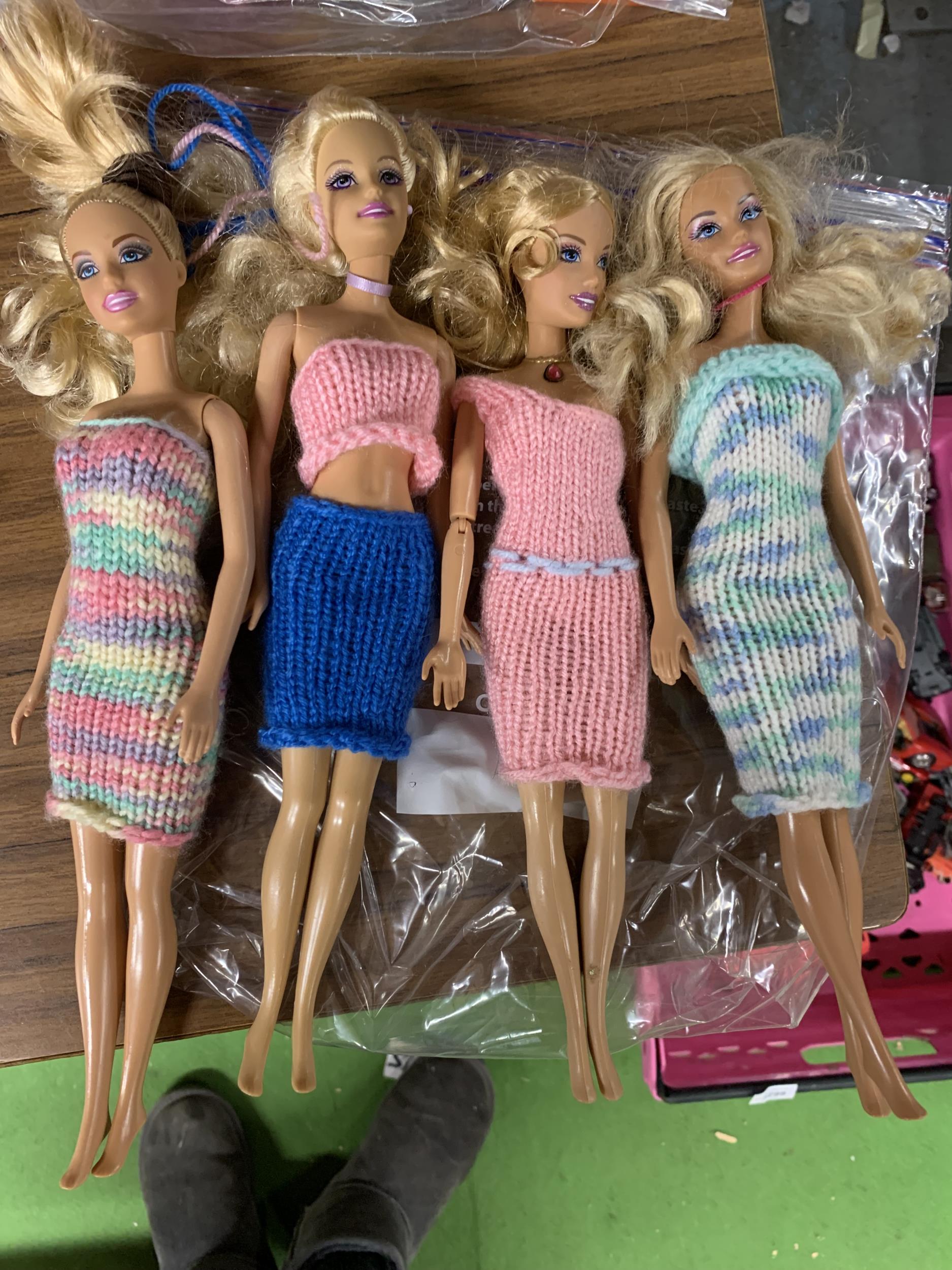 A BAG OF FOUR MATTEL DOLL FIGURES