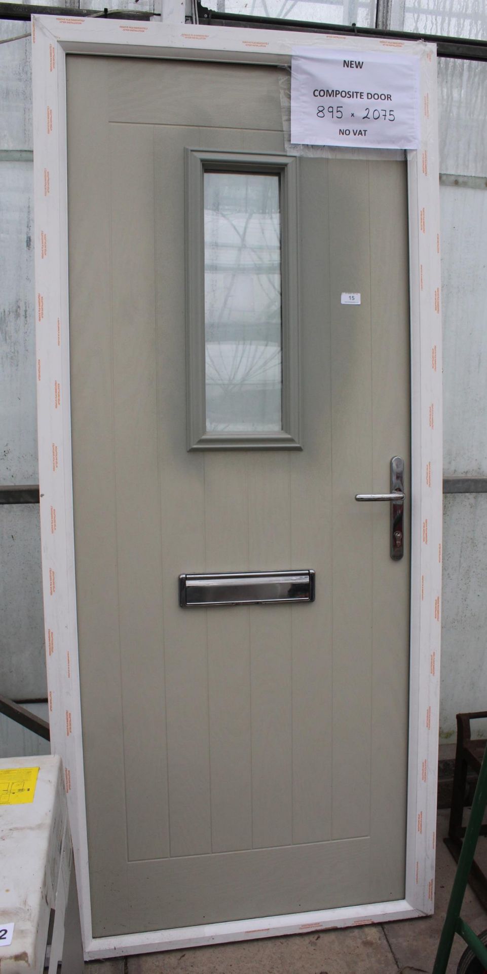A NEW GREY COMPOSITE DOOR AND FRAME 895MM X 2075MM WITH 3 KEYS NO VAT