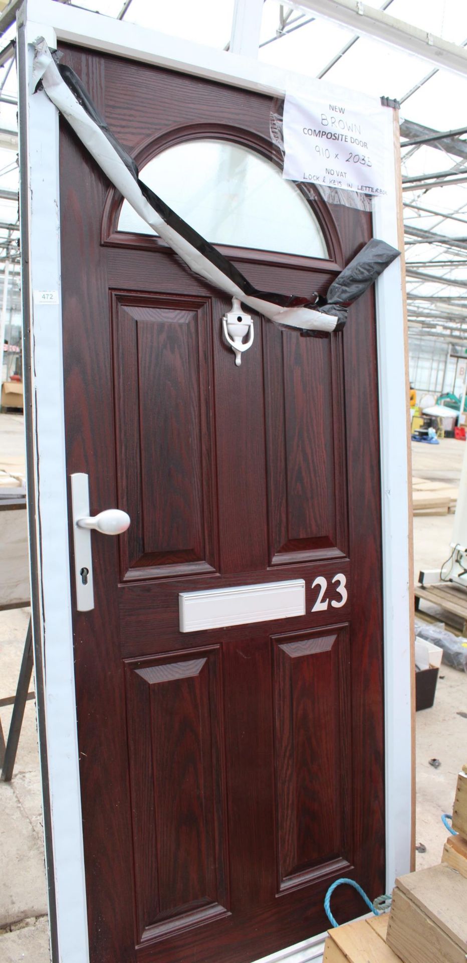 A NEW BROWN COMPOSITE DOOR AND FRAME 910MM X 2035MM LOCK AND KEYS IN LETTER BOX NO VAT