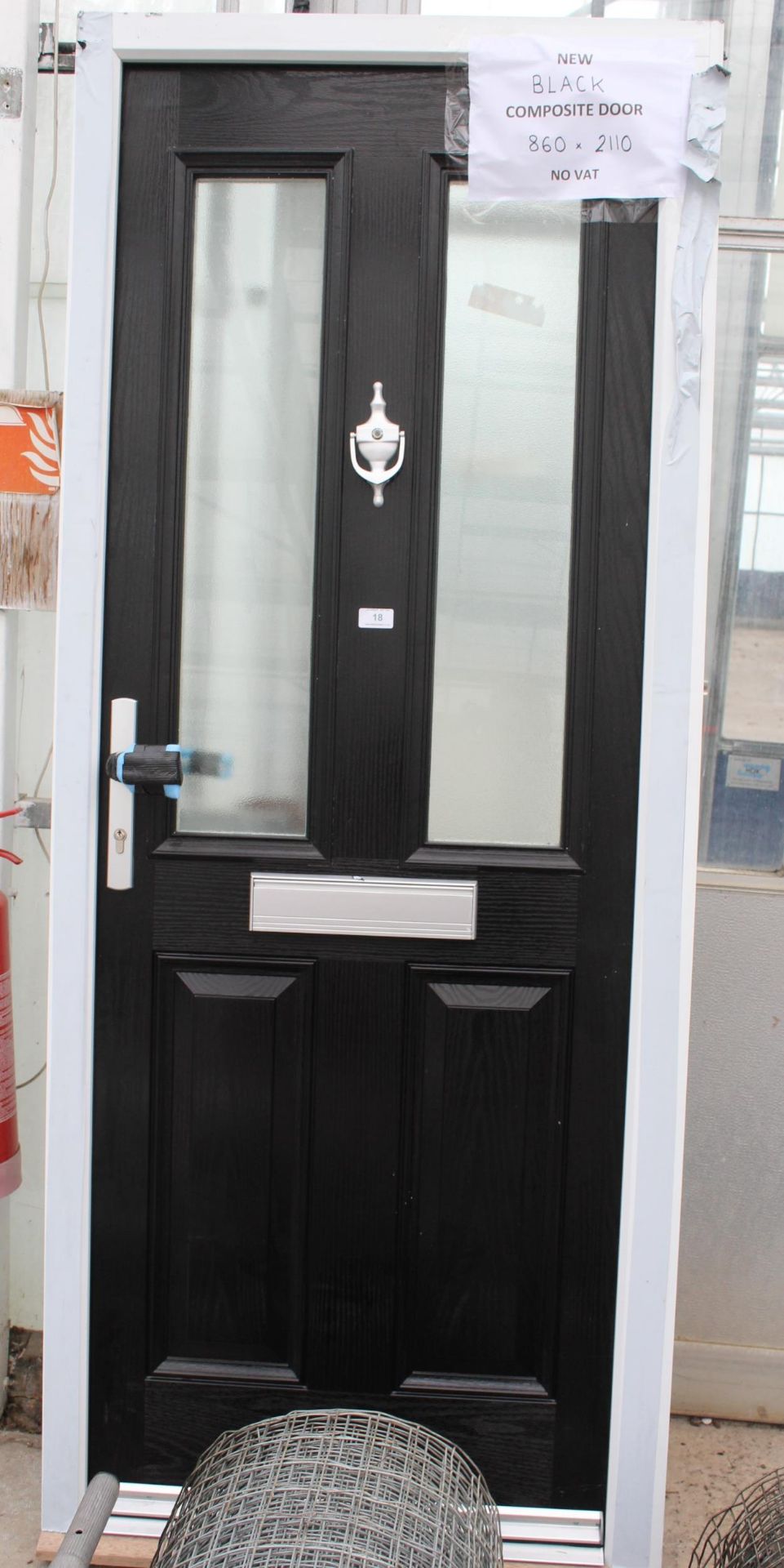 A NEW BLACK COMPOSITE DOOR AND FRAME 860MM X 2110MM WITH 3 KEYS NO VAT