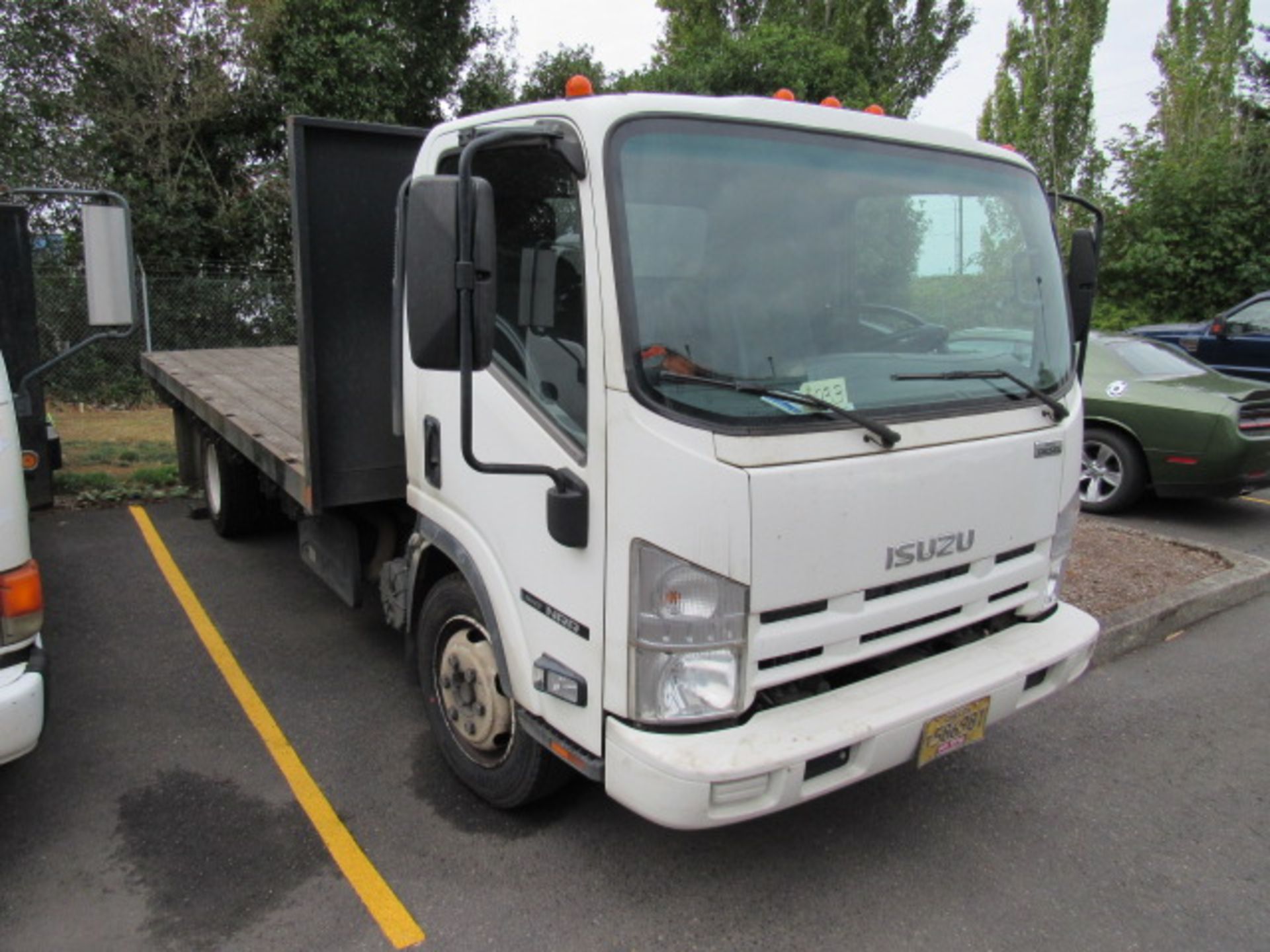 Isuzu NRR Automatic Flatbed Diesel Truck - Image 2 of 9