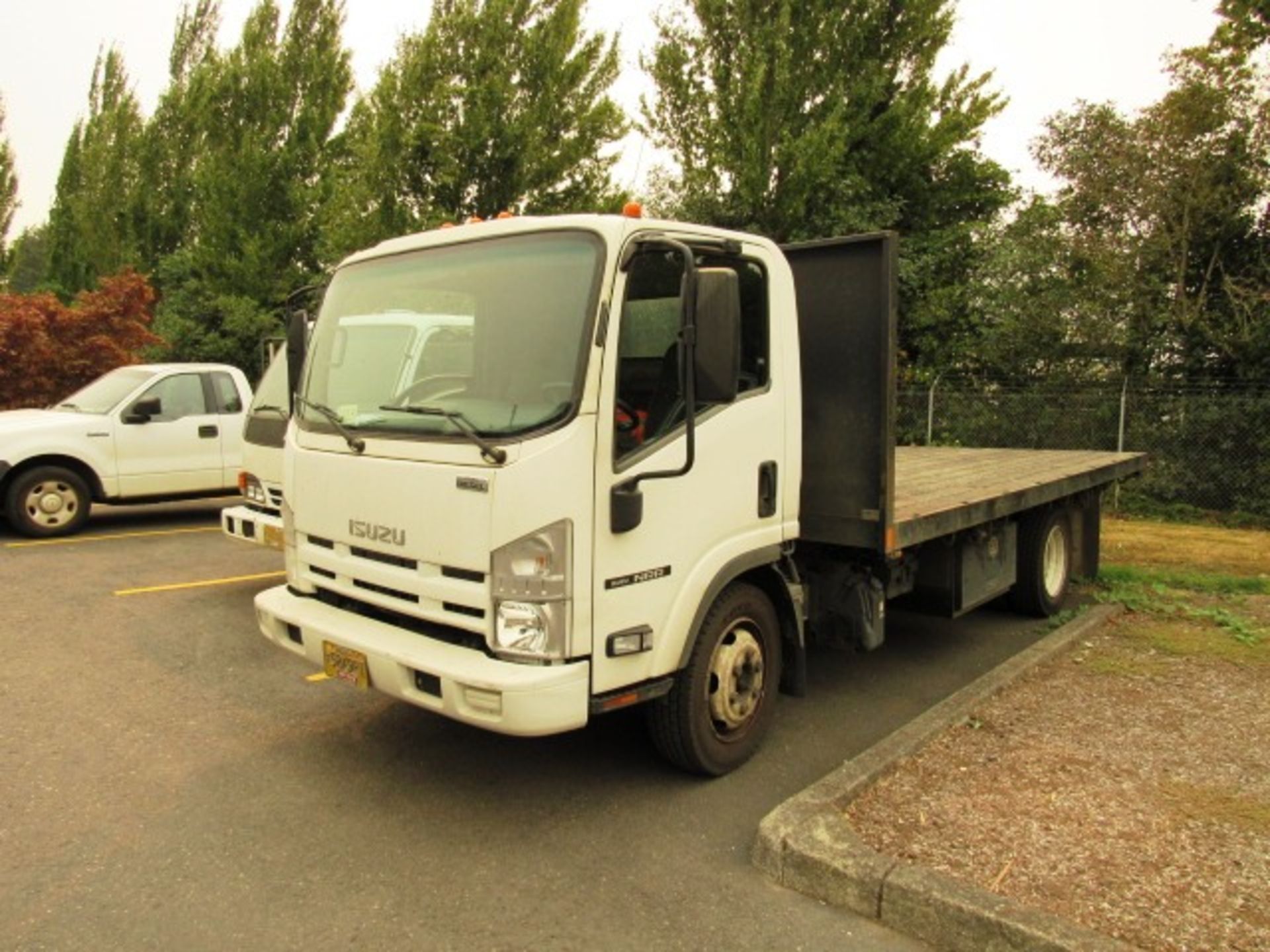 Isuzu NRR Automatic Flatbed Diesel Truck