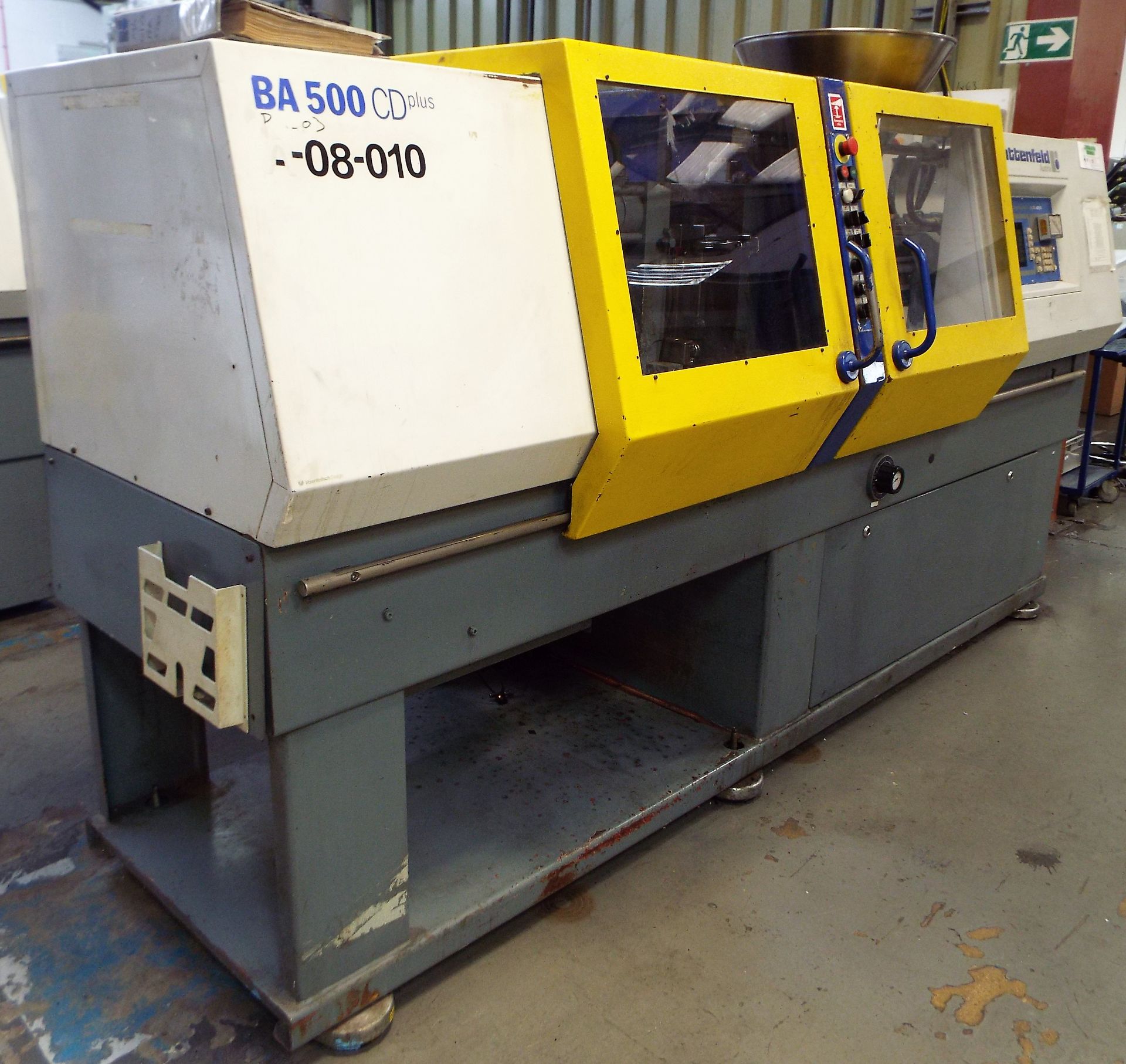 This is for a used Battenfeld BA500 CD Plus Plastic Injection Moulding Machine cw Unilog 4000